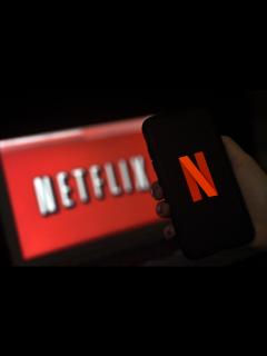 [x]ネットフリックス、パスワード共有への対応が下期成長押し上げへ - Bloomberg